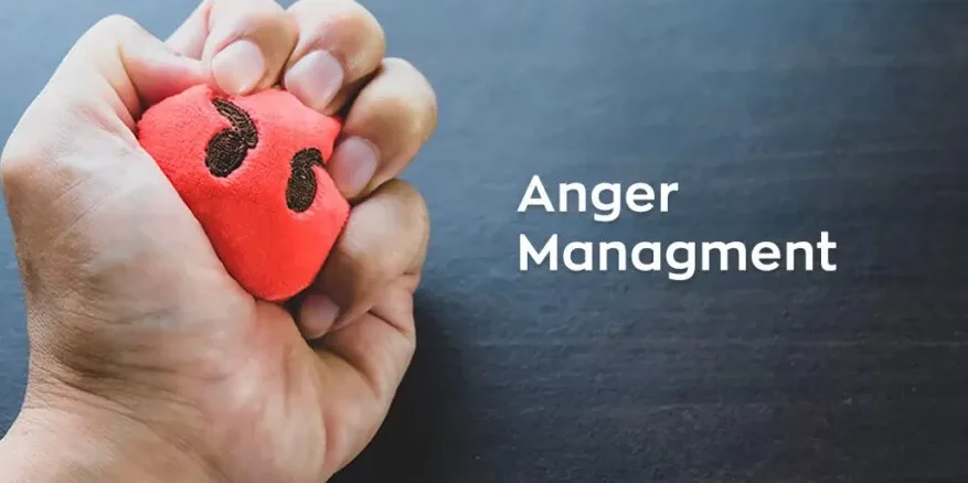 Man crush a red ball to overcome anger